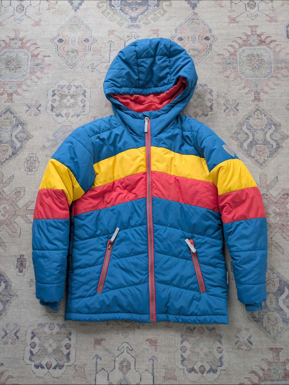Hatley Blue Puffer Jacket with Yellow & Red Chevron Stripes